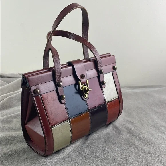 Vintage Brown Satchel with Structured Design and Metal Accents - Picture 1 of 15